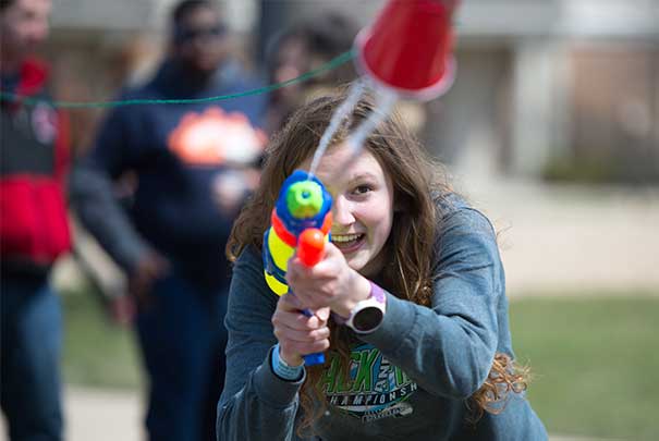 students playing water gun games at the UVs