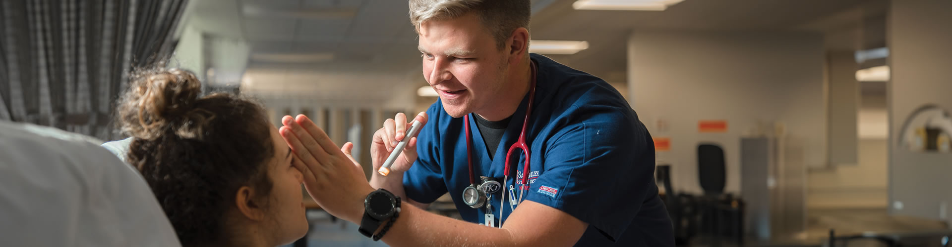 Nursing student with patient